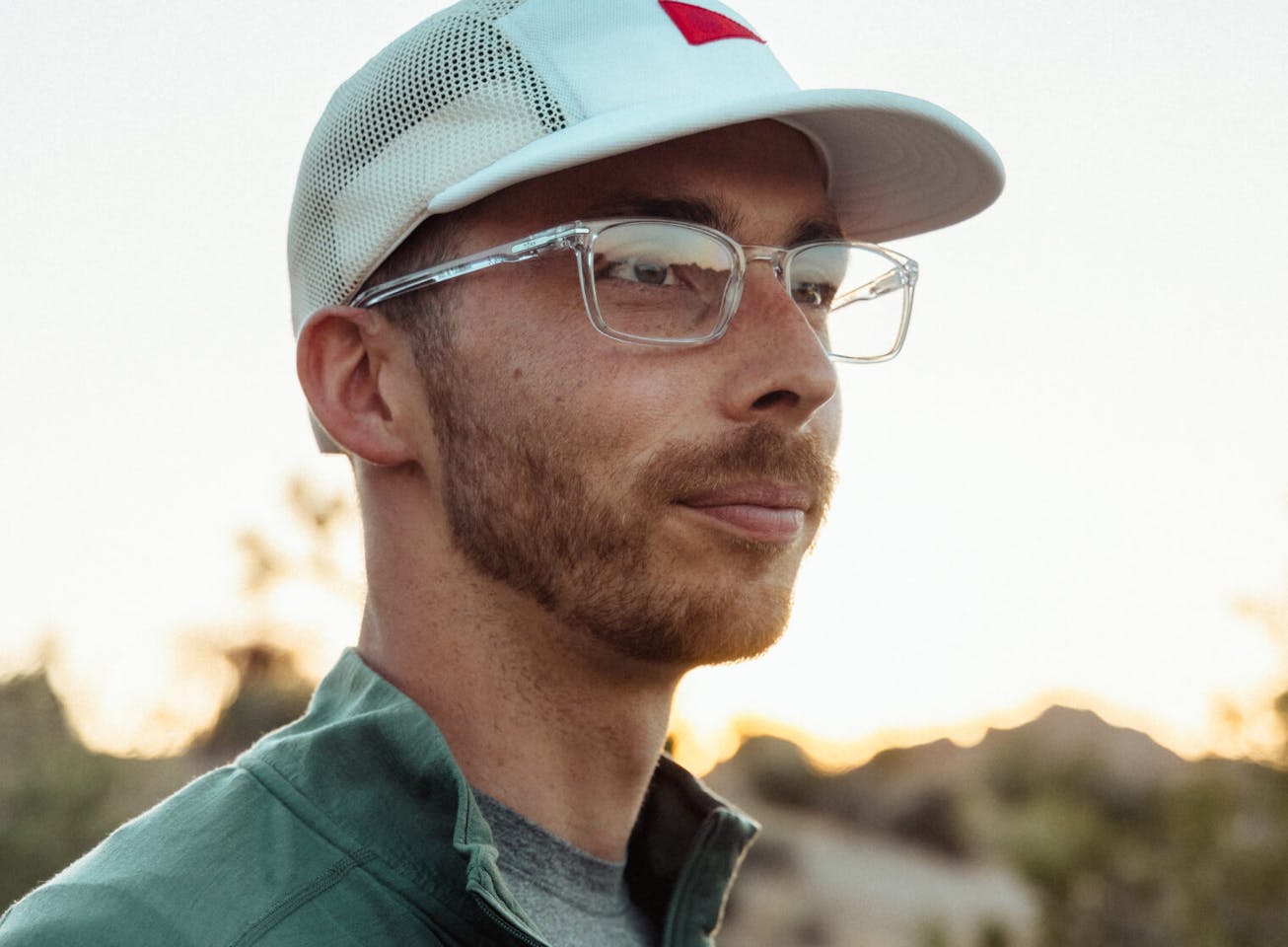 Man in white hat and Palmer eyeglasses