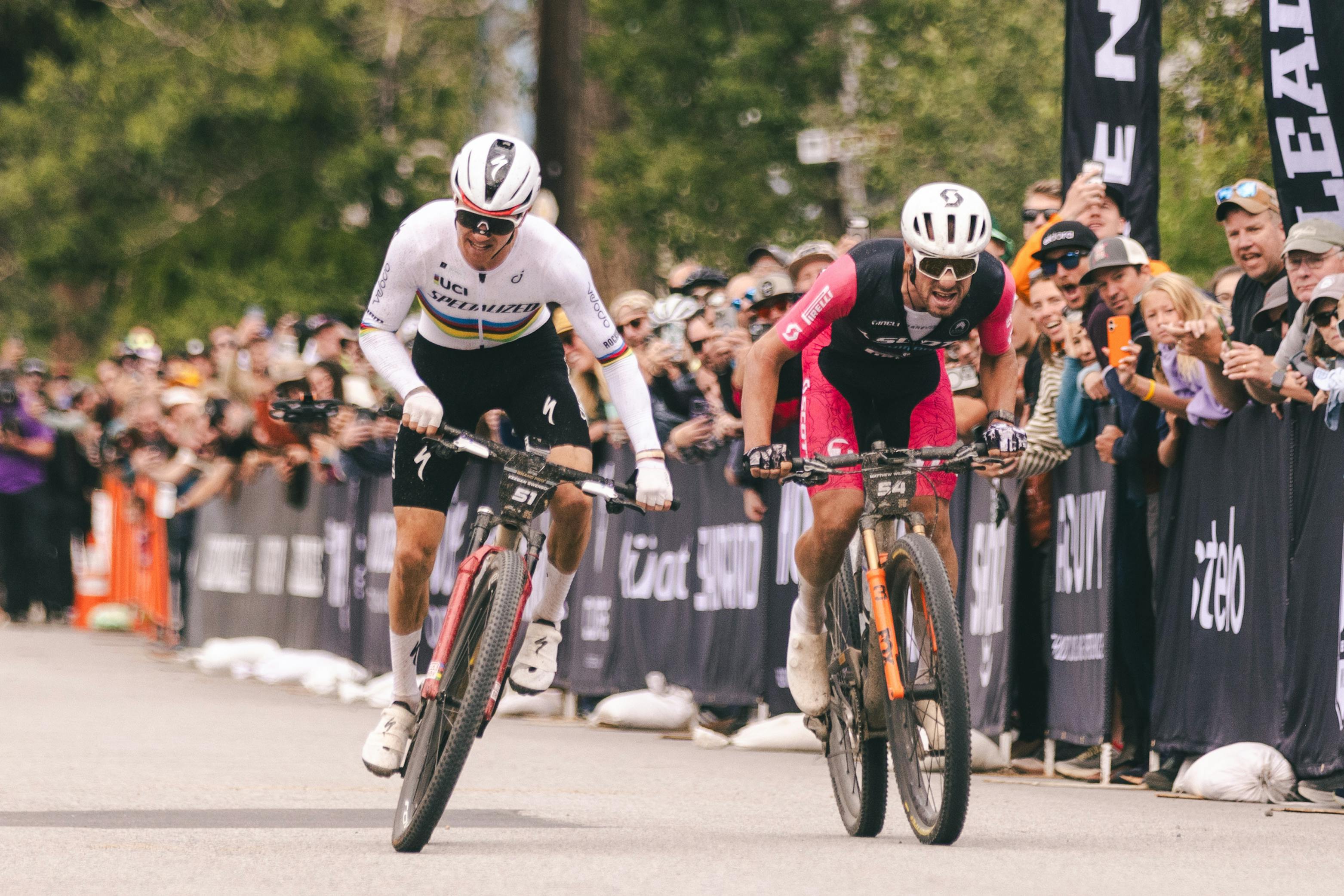 Two riders sprinting to the finish line