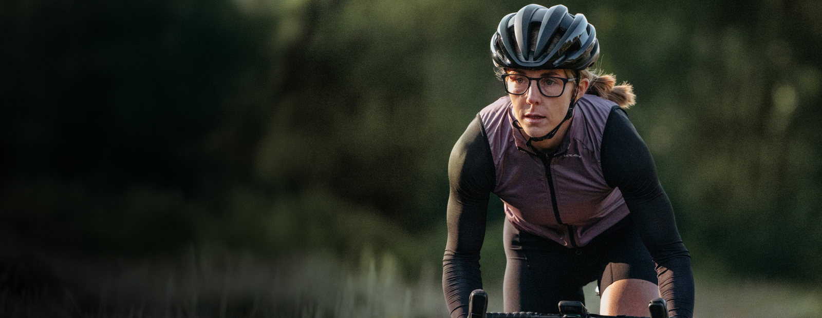 Woman cycling in ROKA eyeglasses
